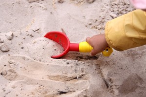 A child playing in the sand