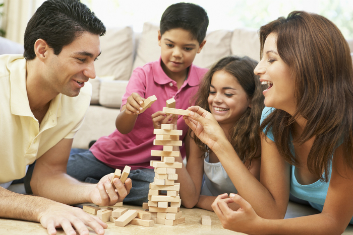 bigstock-Family-Playing-Game-Together-A-13910576