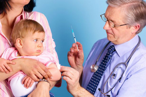 A baby getting an injection