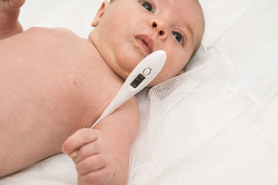 baby thermometer to measure the temperature of a sick child