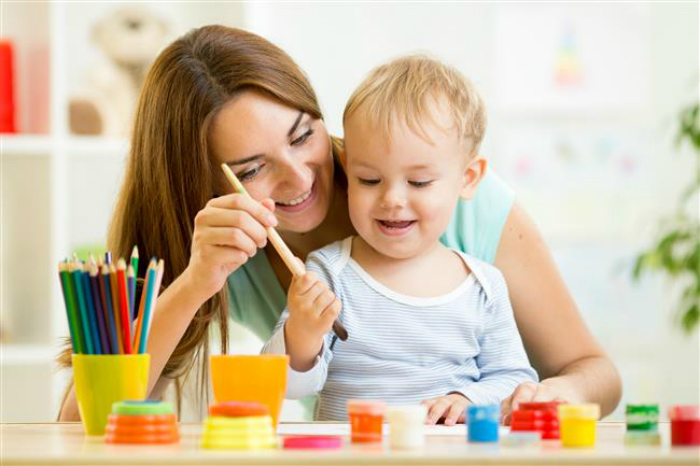 bigstock-mom-and-kid-boy-paint-together-74871589