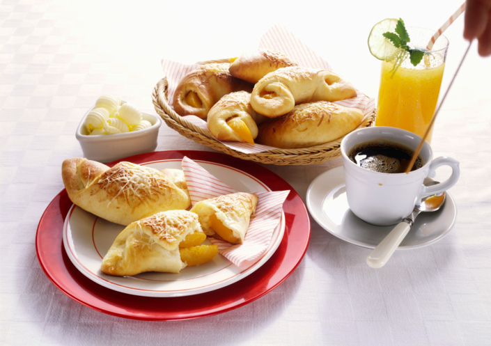 Breakfast with Cheese Pastries and Orange Juice