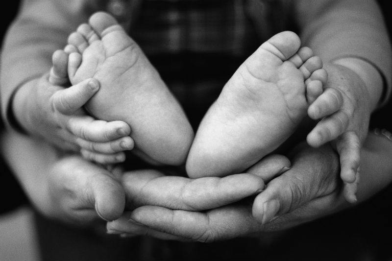 baby-feet-parents-hands