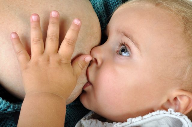 bigstock-Breastfeeding-27426740