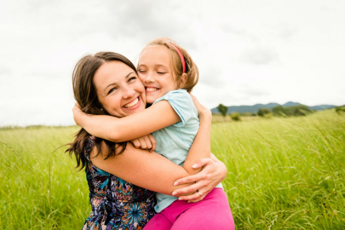 bigstock-Mother-and-child-hugging-71764597