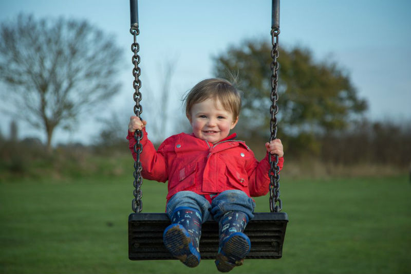 toddler-on-swing