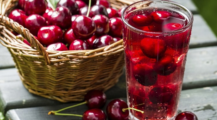 Fresh juice made of sweet cherries and ice