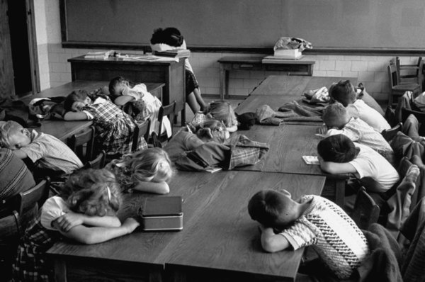 Students taking a nap in mid-morning on their first day of school.  (Photo by Leonard Mccombe/The LIFE Images Collection/Getty Images)